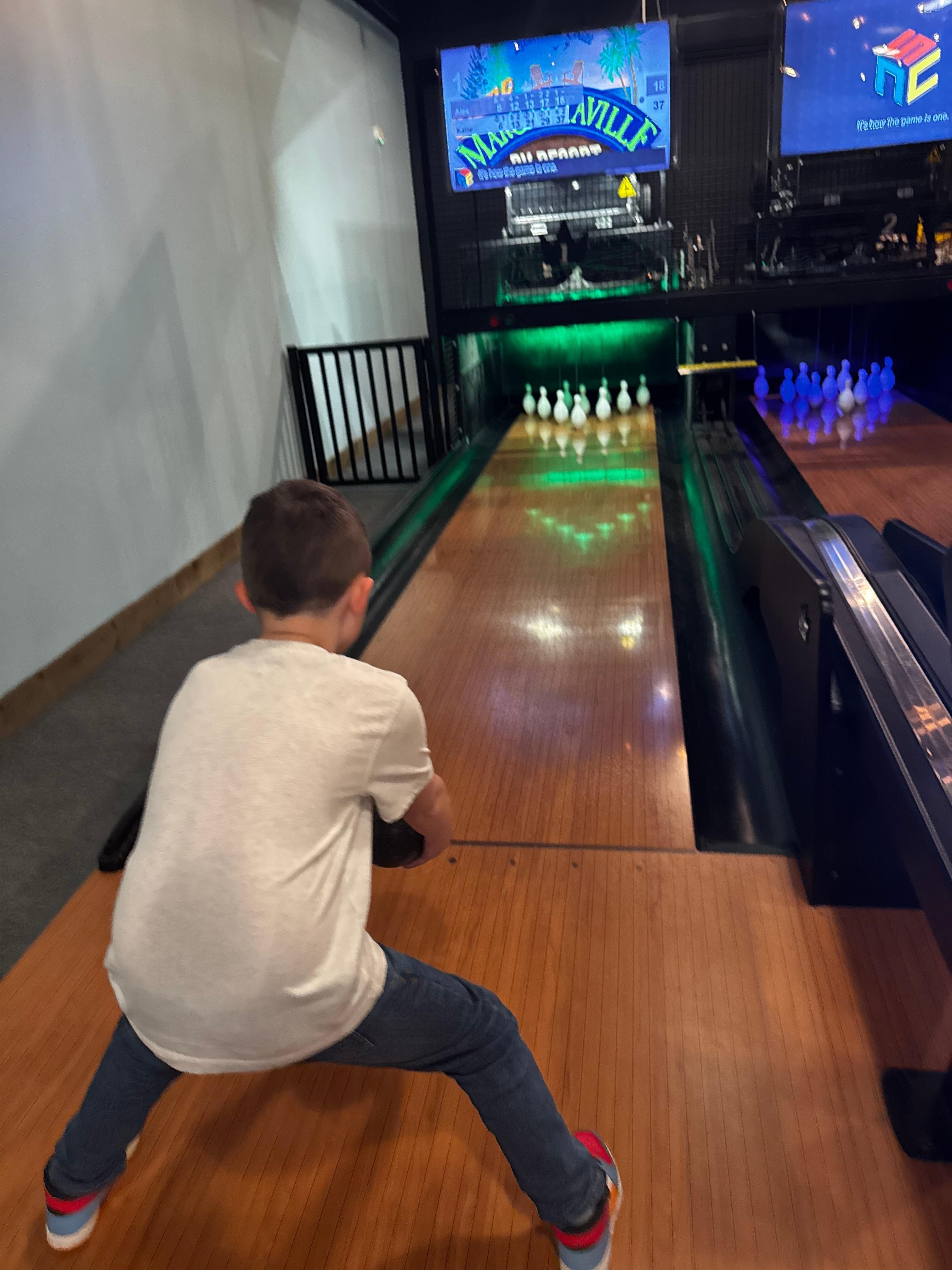 Bowling downstairs was a lot of fun. 