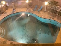 Filthy pool. You can see how much dirt and scum are in the bottom of the pool