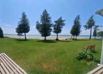 A view from the deck. Great deck for out for eating and games. It has covering from the sun.