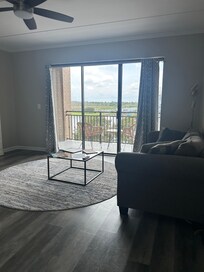 Living space that leads to balcony.