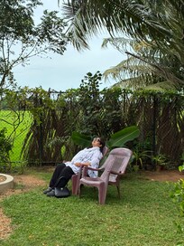 Relaxing in the garden with coconut palms