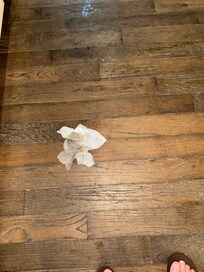 Dirty floor, easily hidden with a dark floor.