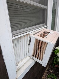 AC was falling out. Added cardboard and push the screen down to cover gaps