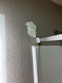 Poor repair of bath curtain rod