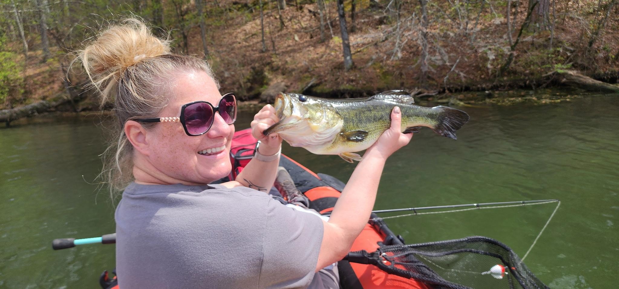 Catching fish from the kayak in the private cove!