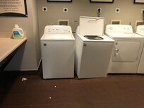 Laundry room was dirty and washing machine looks messed up!
