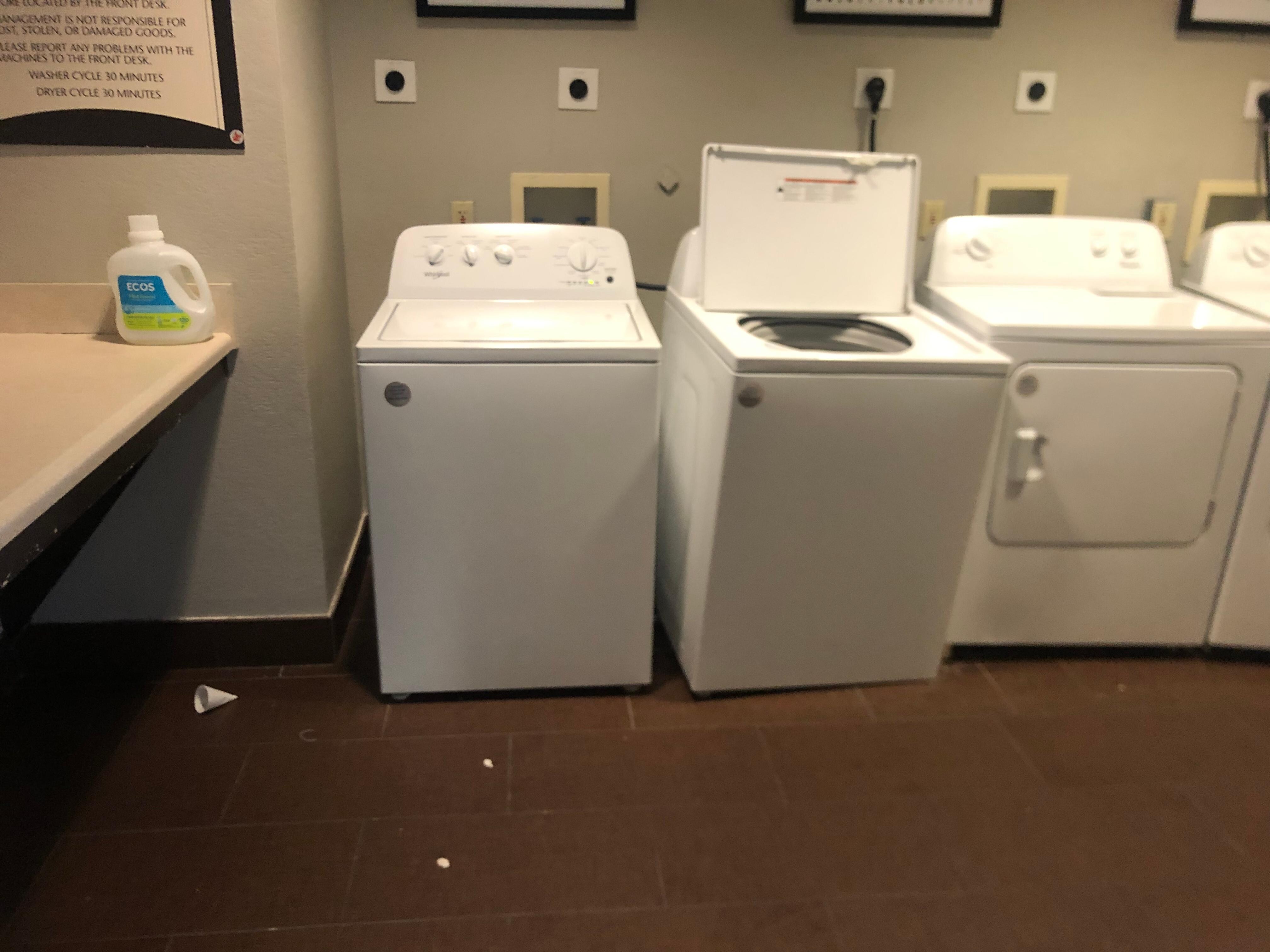 Laundry room was dirty and washing machine looks messed up!