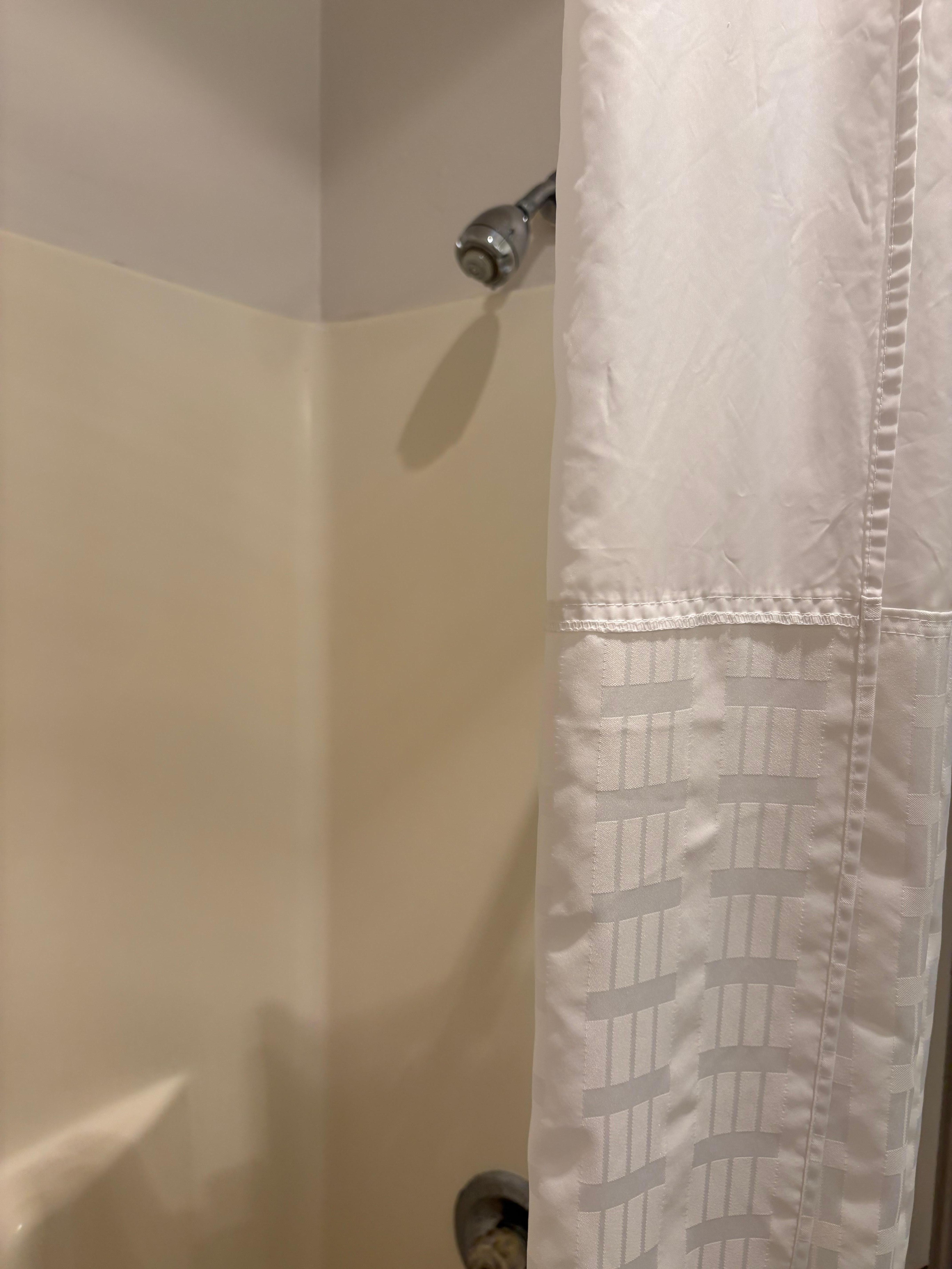 Shower had to be pointed at the wall to make sure water wasn’t getting all over.