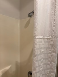 Shower had to be pointed at the wall to make sure water wasn’t getting all over.