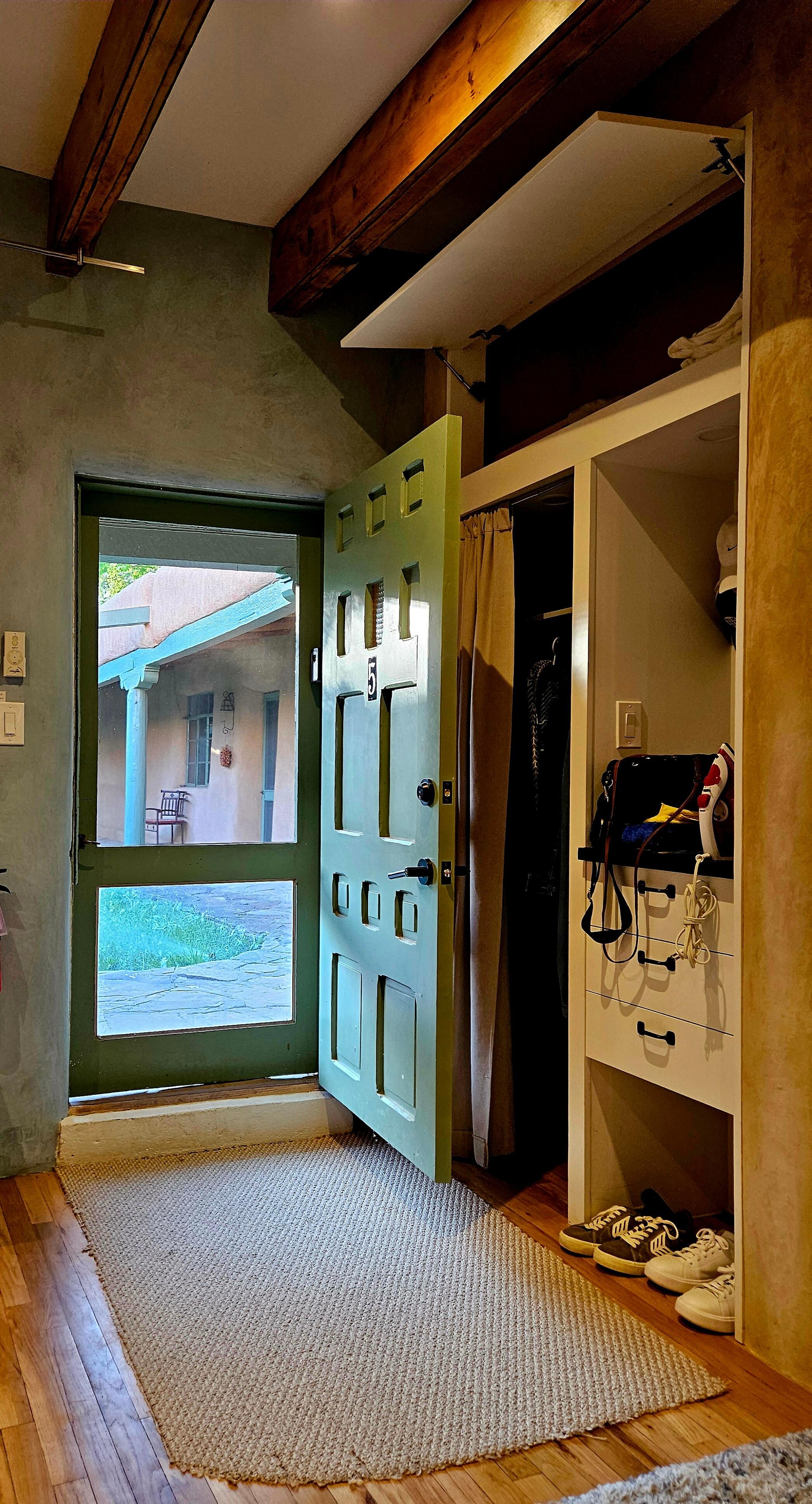 Looking out into private courtyard from inside the studio 