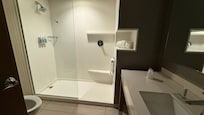 Huge walk-in shower and great layout. No safety grab bars in the shower