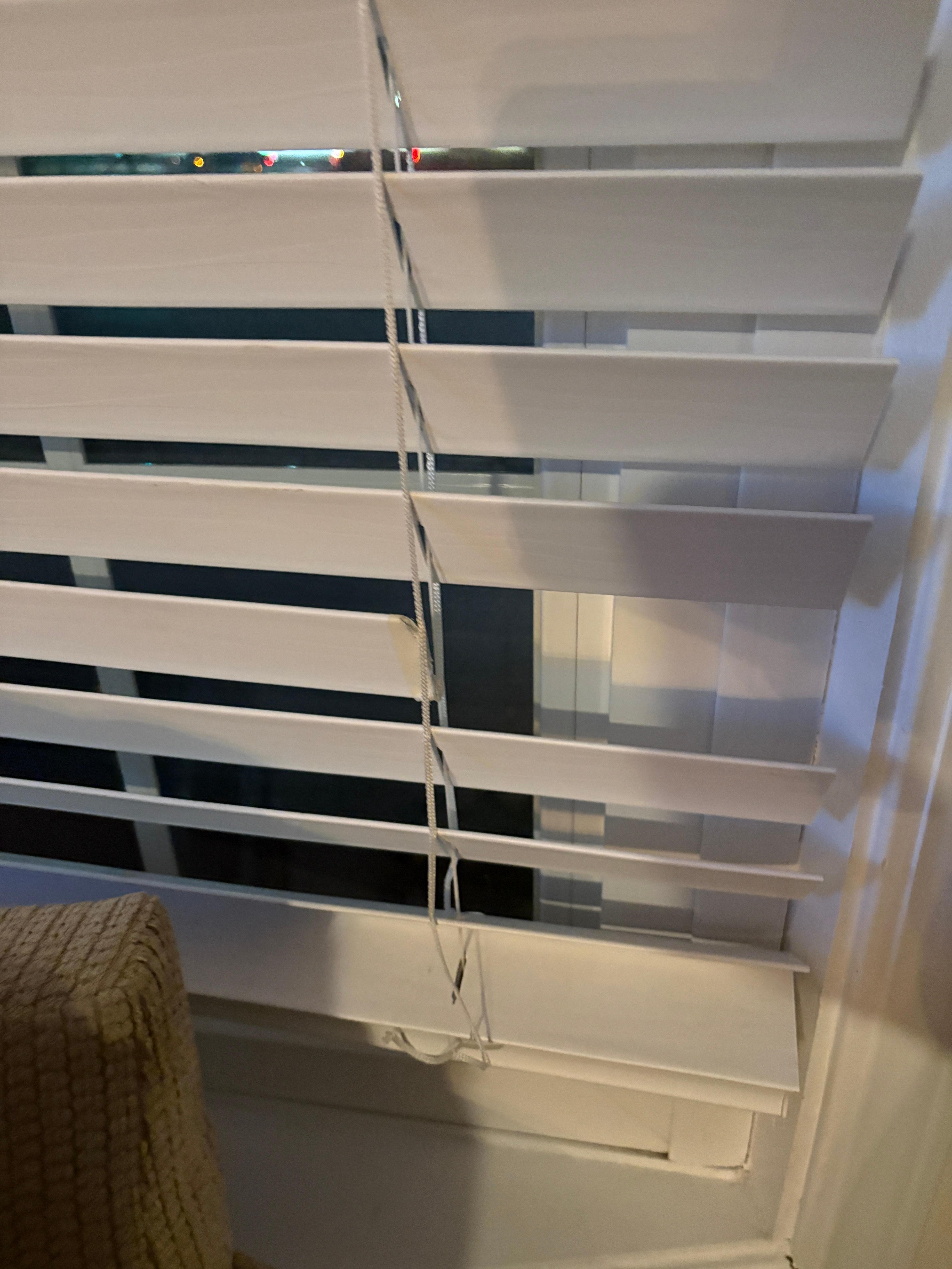 One of 3 broken blinds
