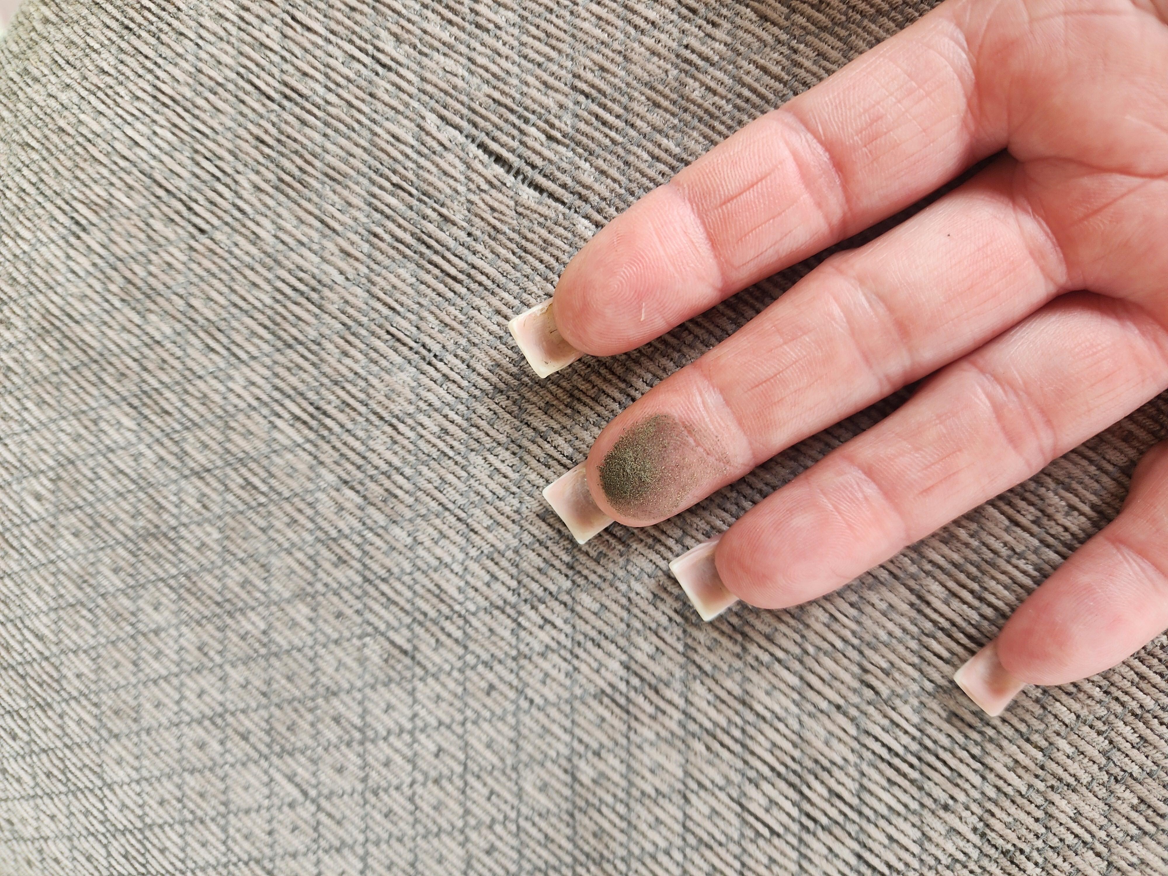Wiping the table with my fingers prior to cleaning so we could sit and relax