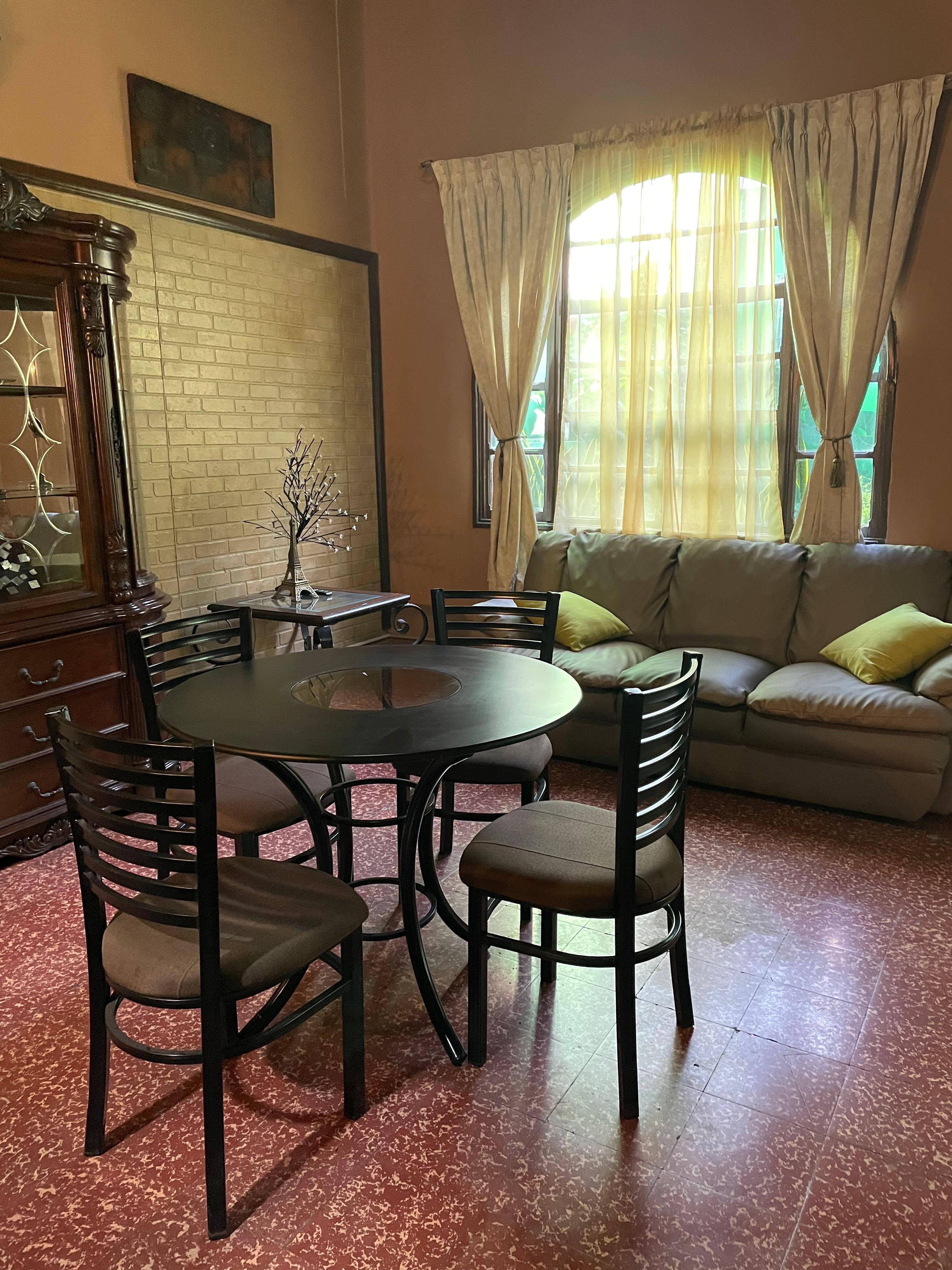 Dining area with large TV