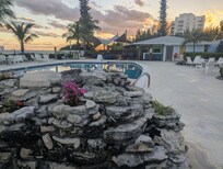 Left corner of photo are few steps down to beach