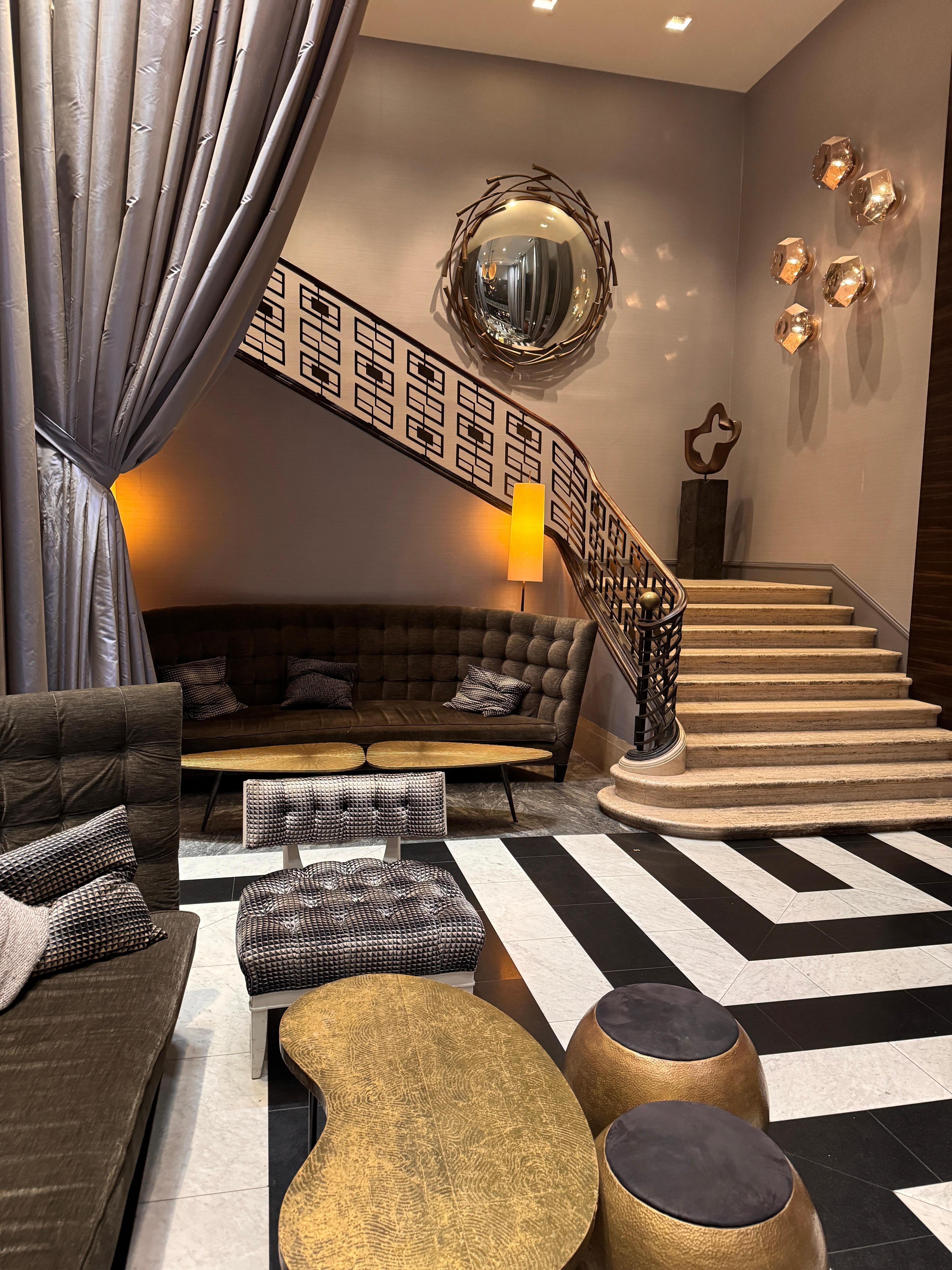 Lobby staircase goes to Rosa’s Mexican restaurant 