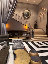 Lobby staircase goes to Rosa’s Mexican restaurant