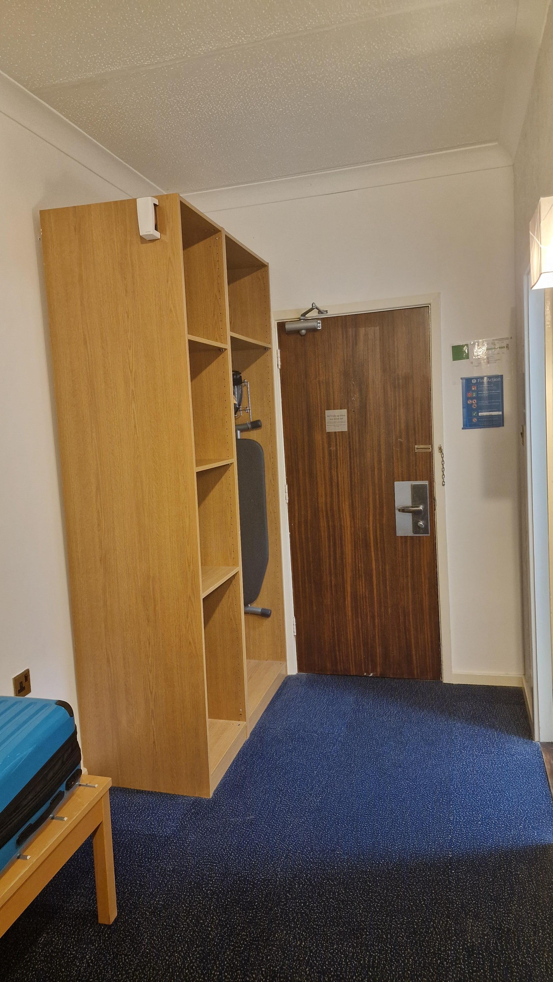 Entrance. Door makes a huge sound when closing. 