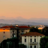 City and Dolomites from the hotel