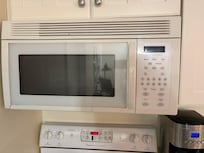 Broken microwave- this was also the vent for stove and only cooking light. None of that worked.