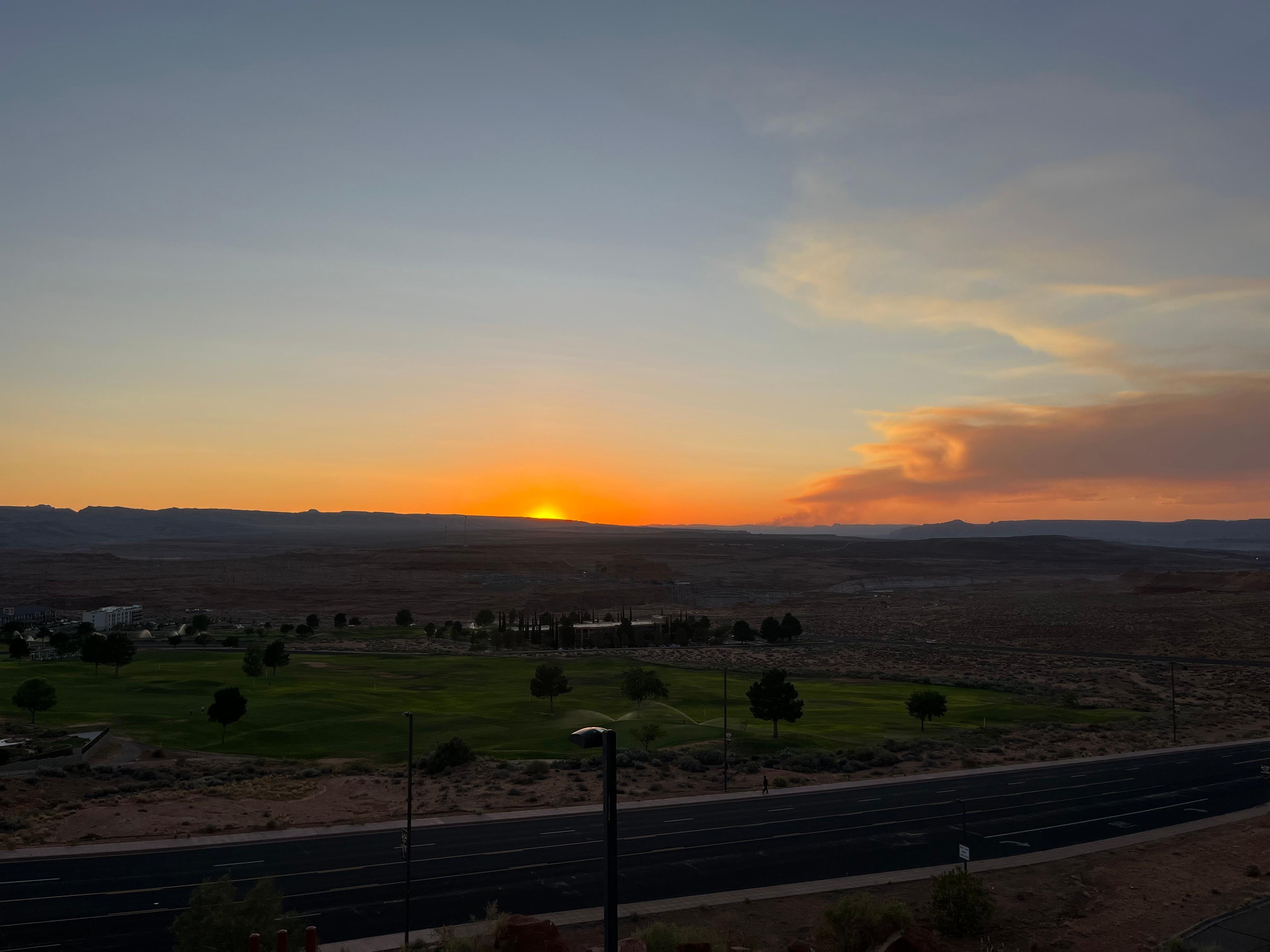 Sunset from balcony overlooking pool