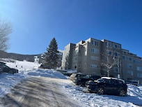 The outside of the condo building