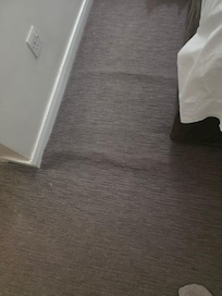 Uneven water damaged carpets