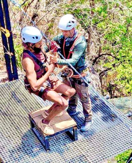 Great Staff Oscar preparing me for ziplining 