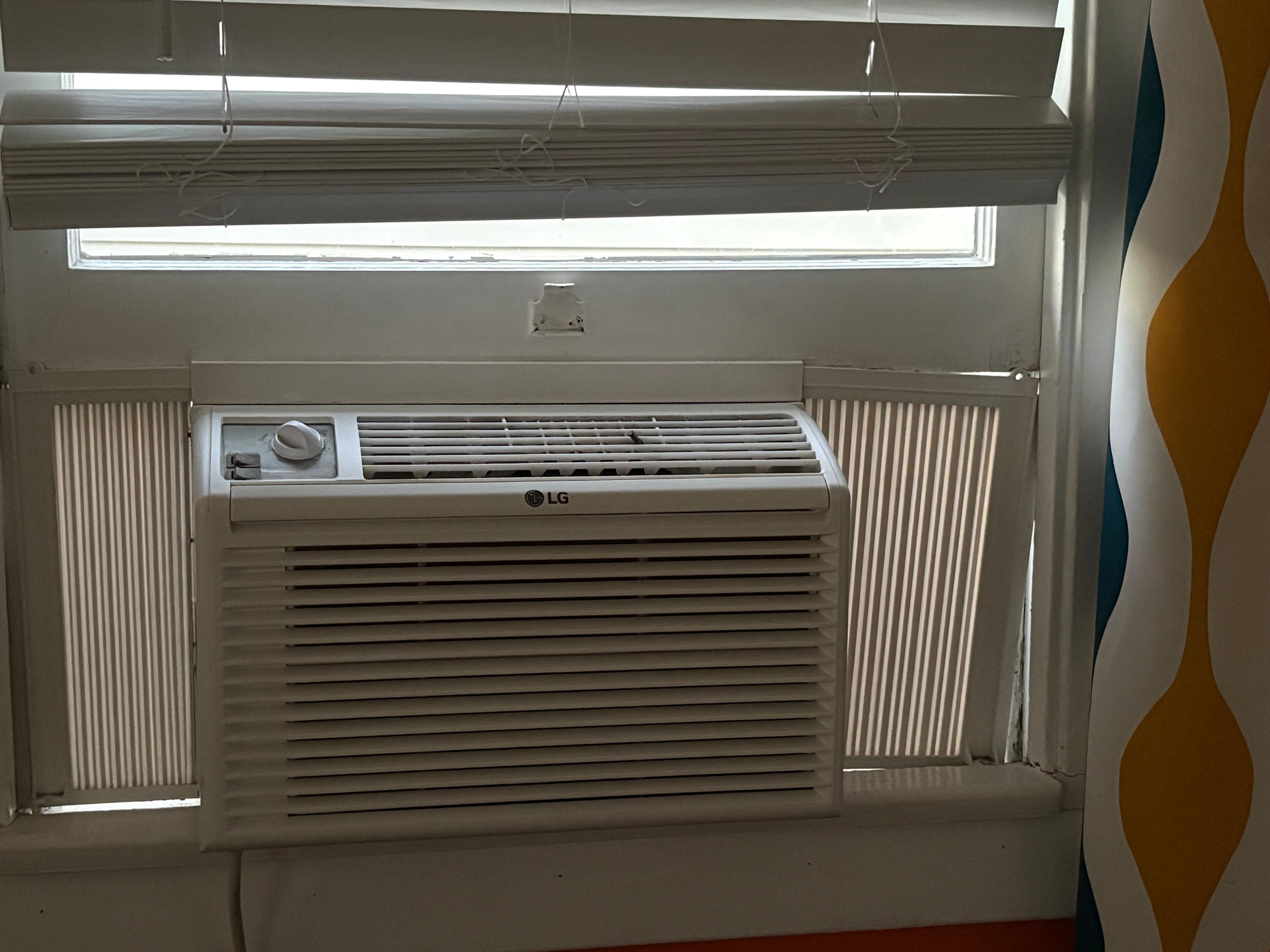 Window unit in living room. 