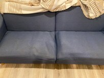 This couch does not match the listing at present. It shows it new from years ago.