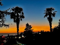 Lovely sunset over the harbor as viewed from the deck at Seas the Day.