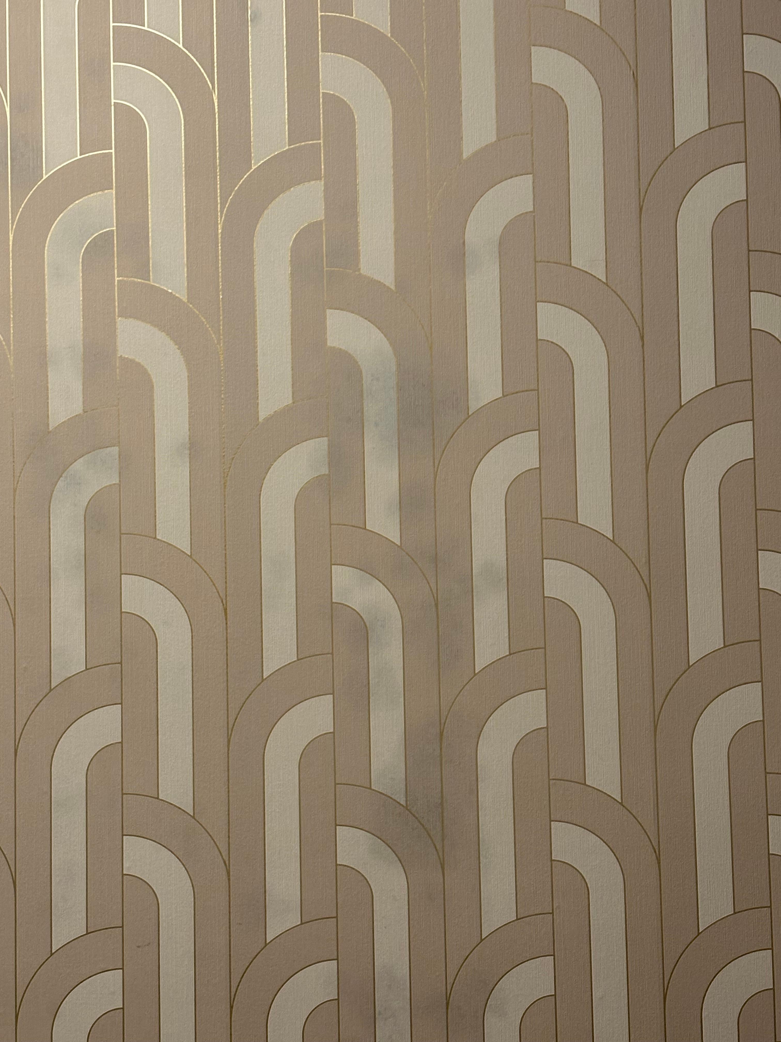 Weird stains or mold coming through wallpaper.