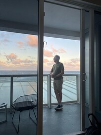 Looking out at ocean at sunset