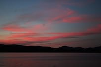 Sunset - sun is behind the viewer but illuminating the clouds nicely.