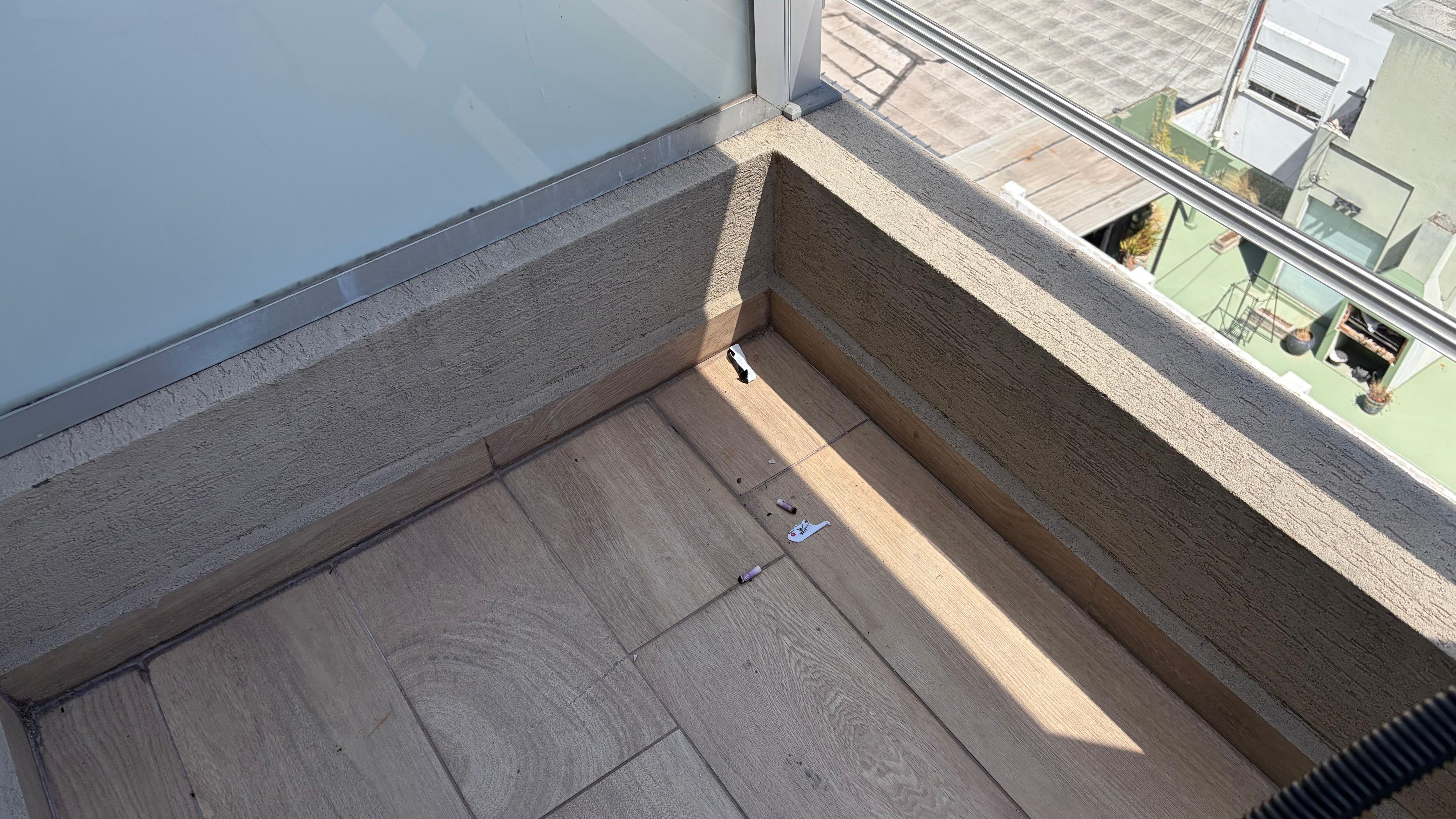 Cigarette butts on balcony