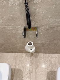 Broken toilet paper holder