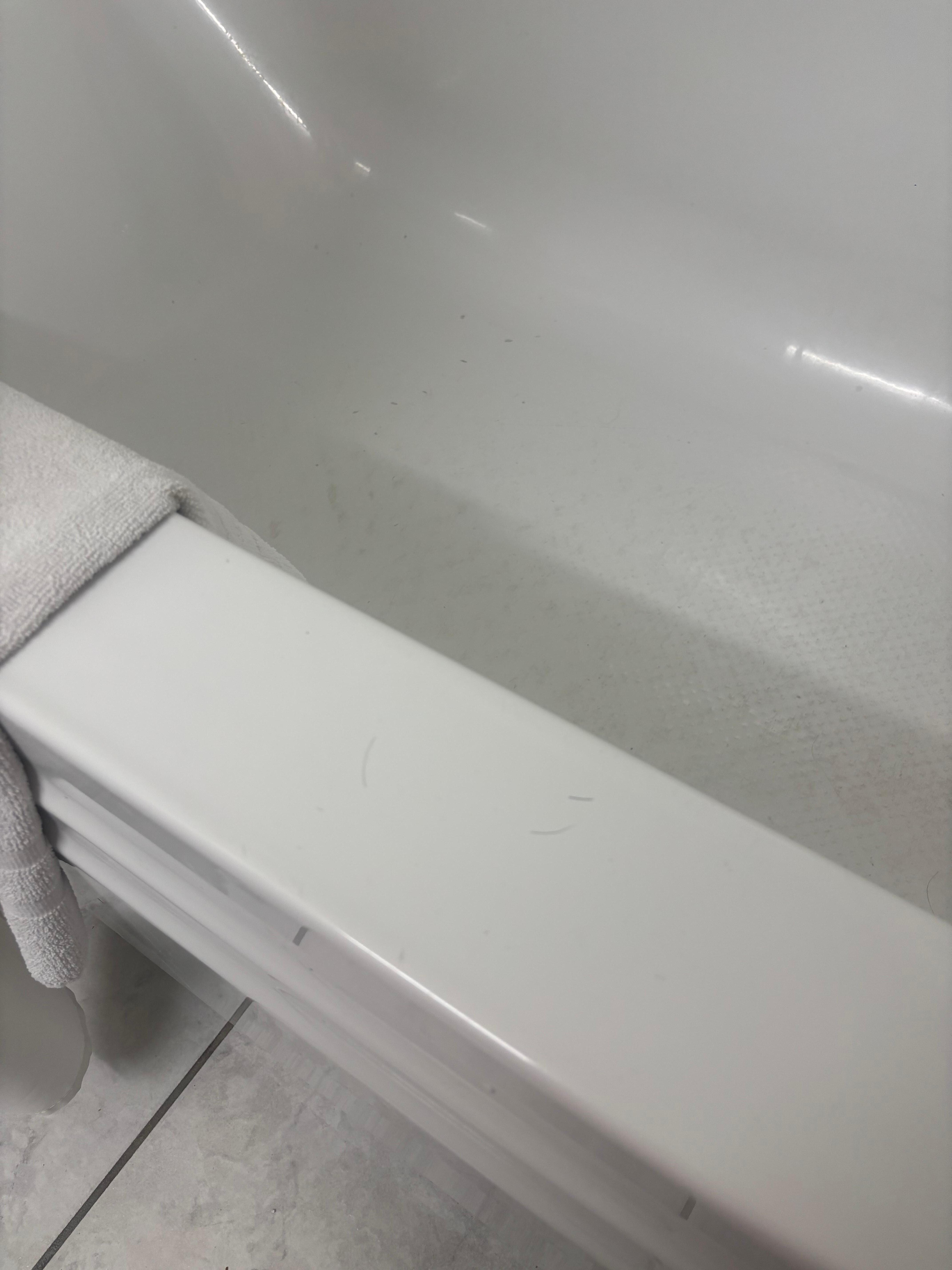 Hair on the tub from previous persons stay