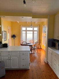 View from the cheerful, well stocked, clean kitchen