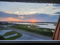 The sunset that greeted us off the screen porch when we arrived