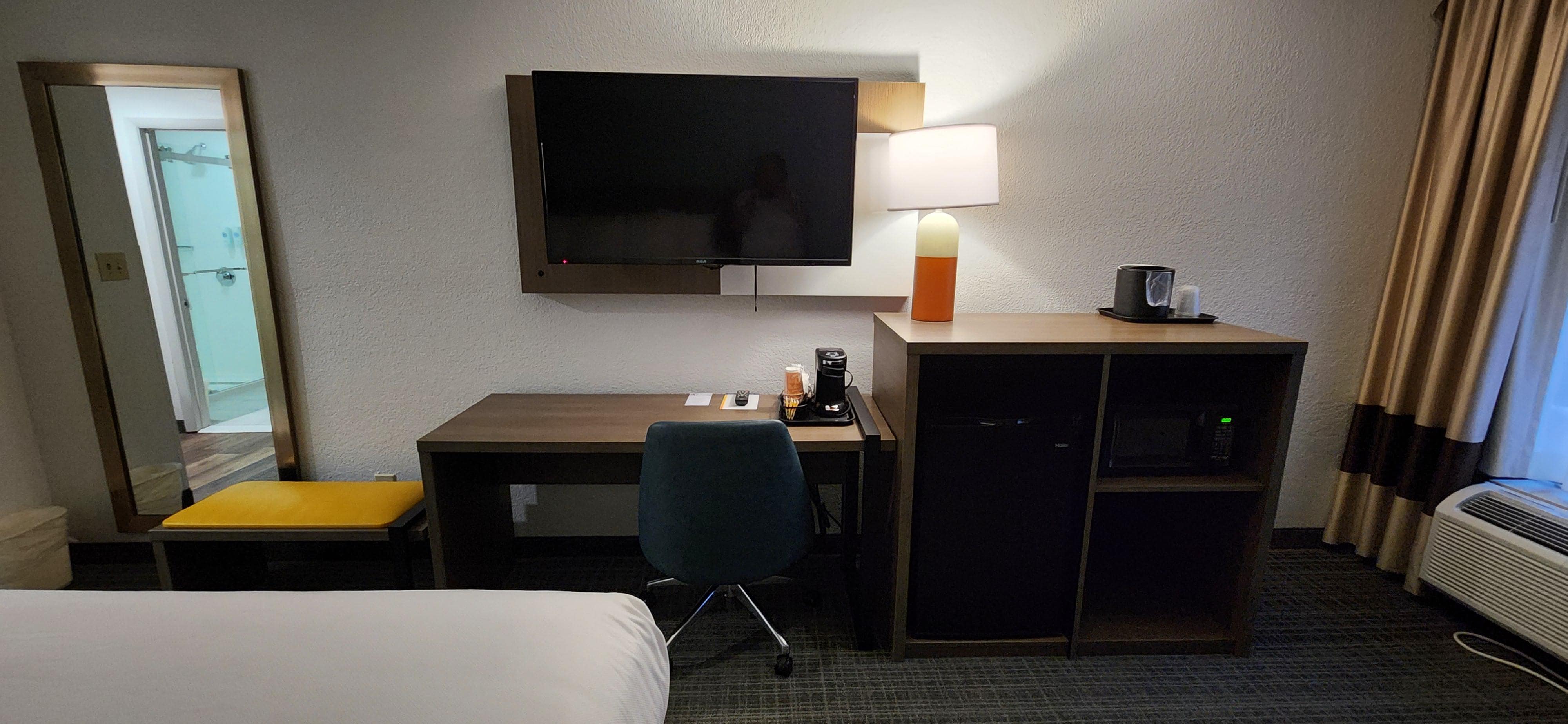 Desk, refrig, micro, full length mirror, TV with plenty channel selection.