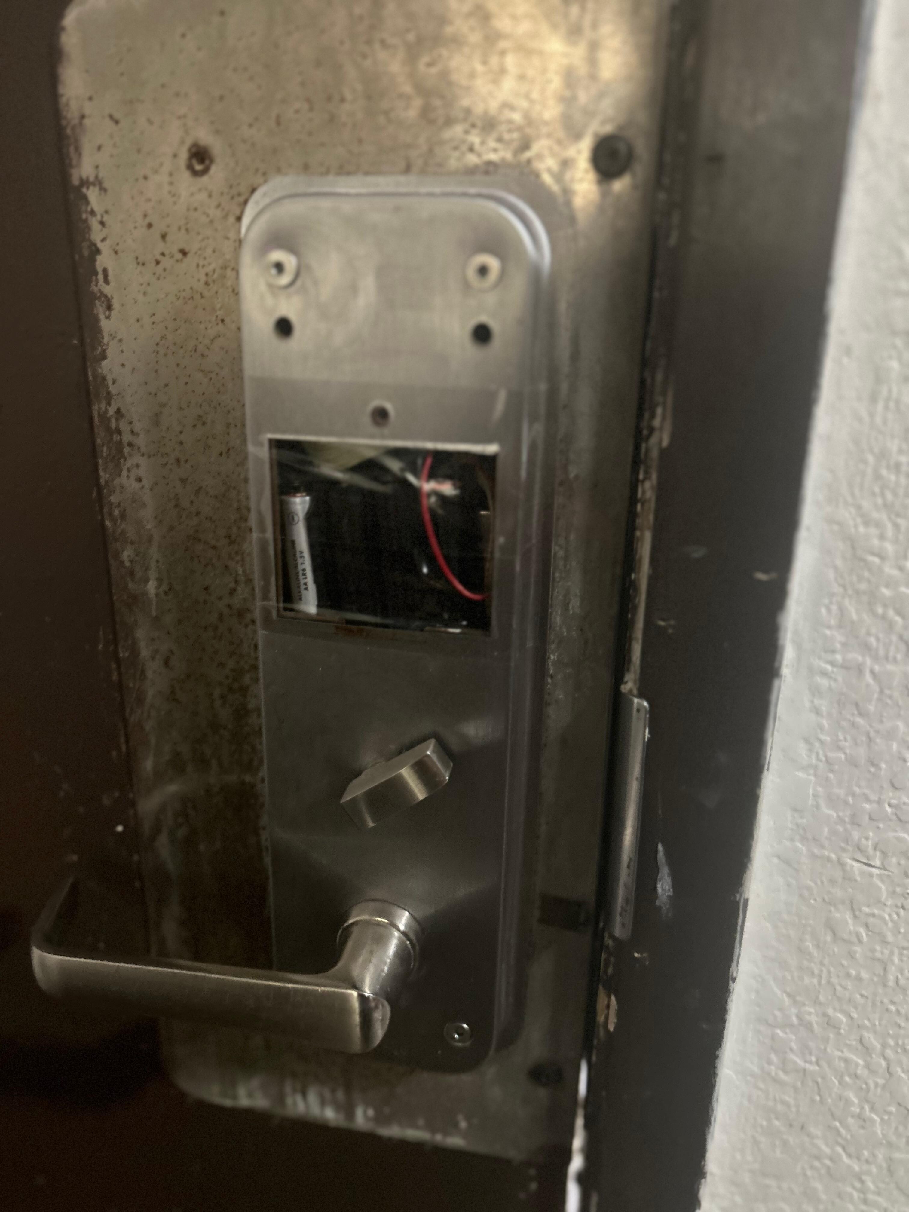No cover to the door lock it was taped together