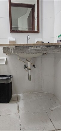 Unfinished or broken edges of sink.