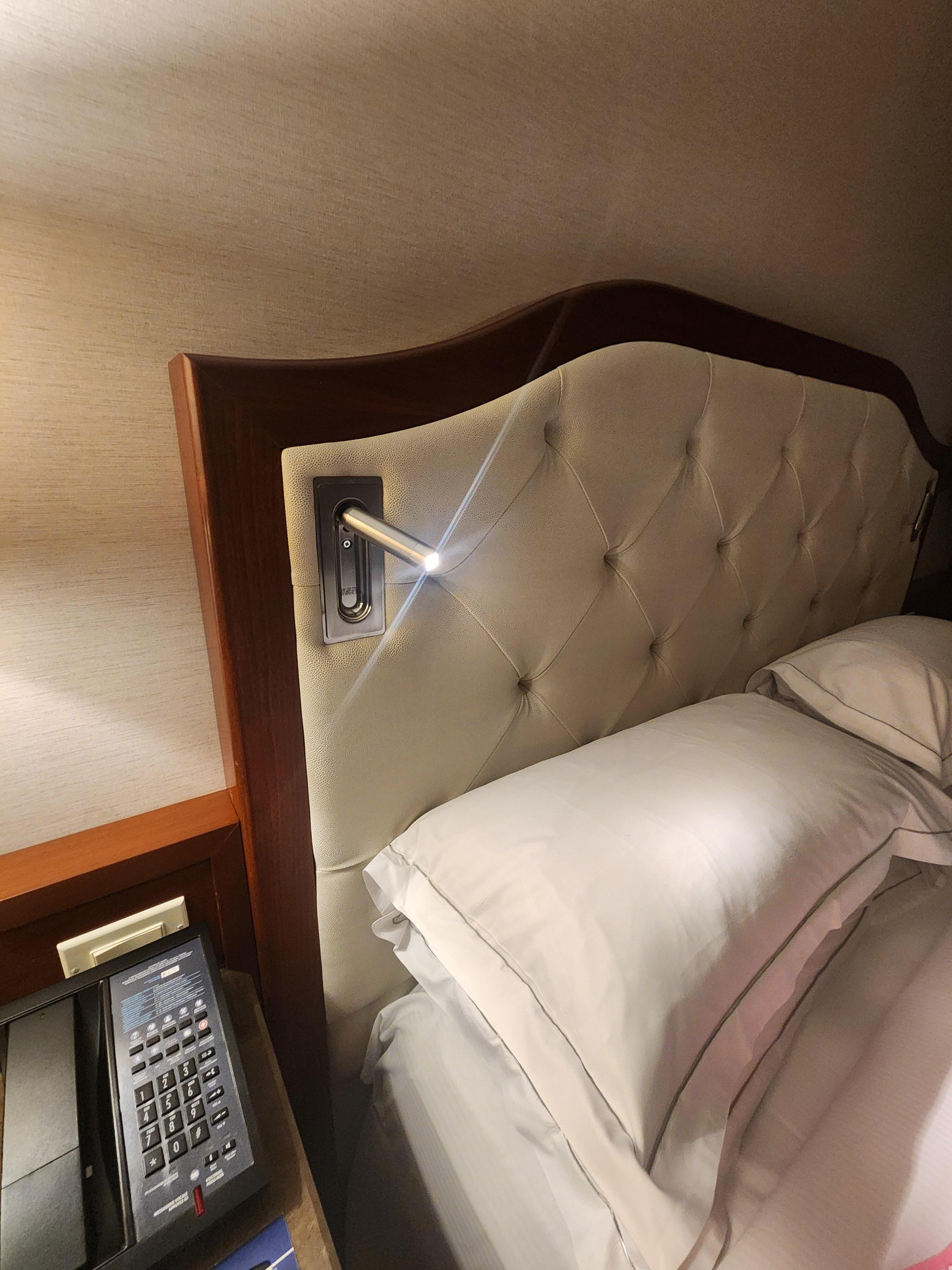 Bed with reading lamps in.