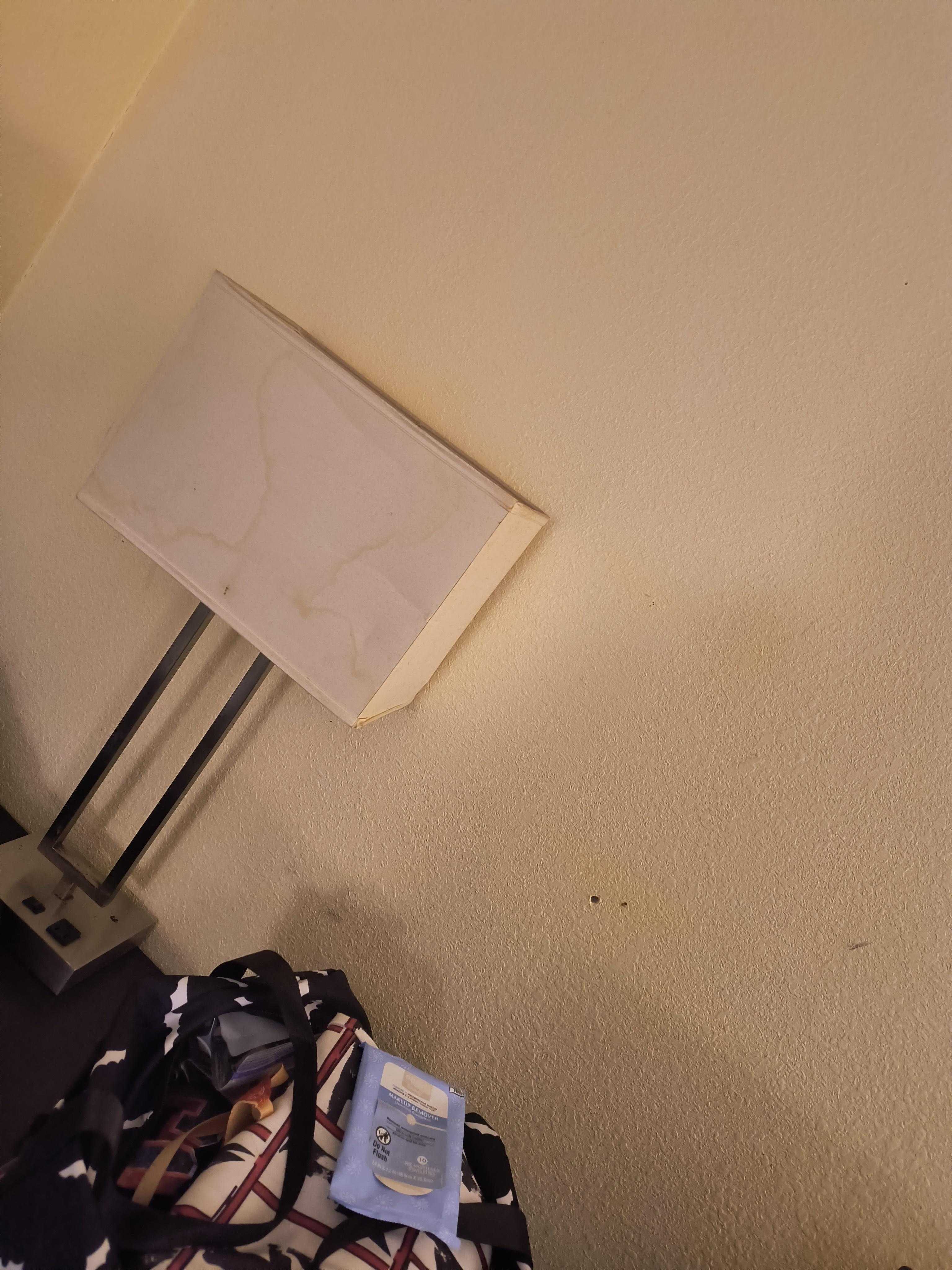 lamp stained and flickery, as well as wall filled stained wall