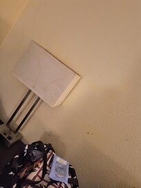 lamp stained and flickery, as well as wall filled stained wall