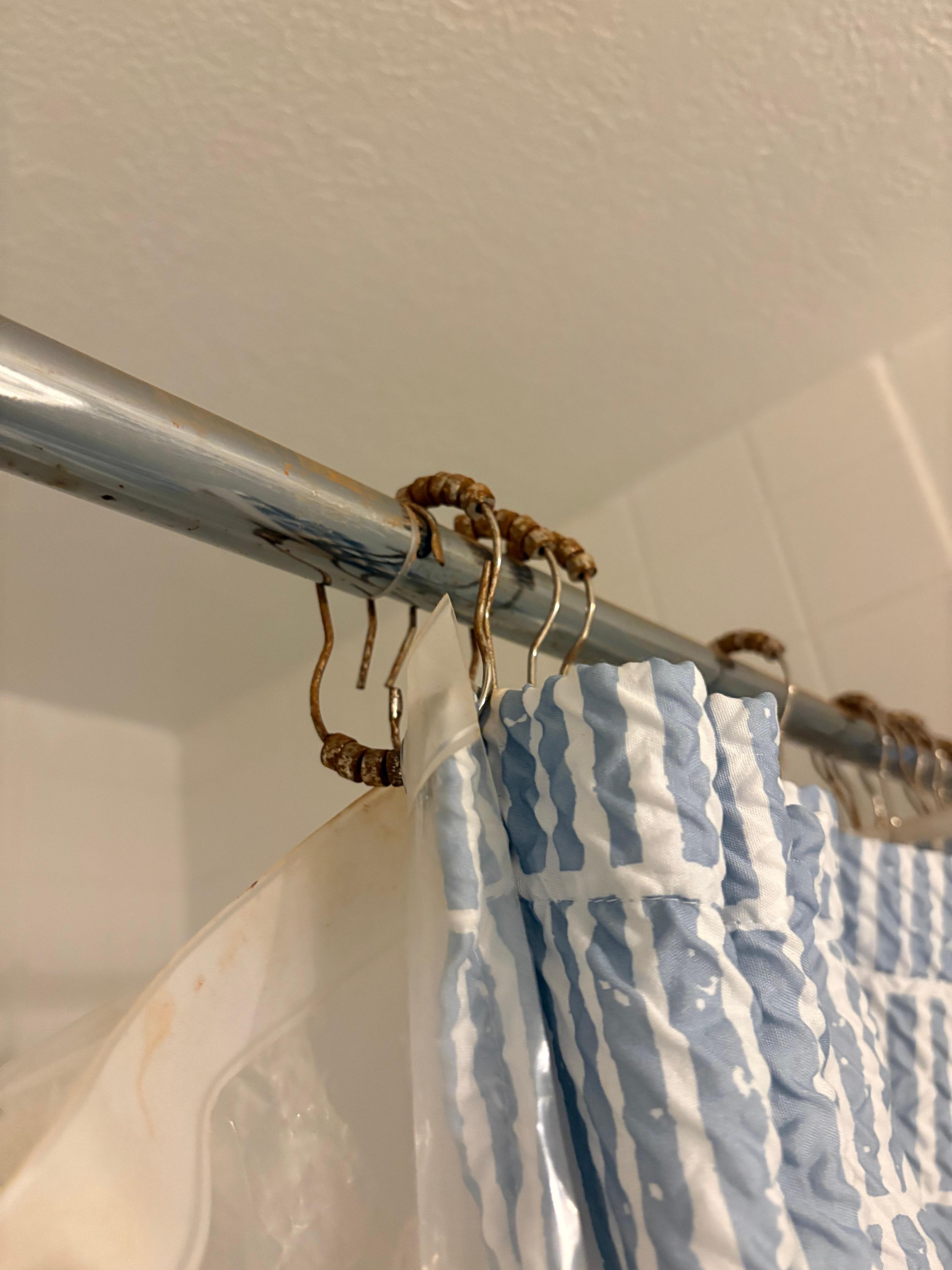 Rusted and Broken Shower Curtain Rings