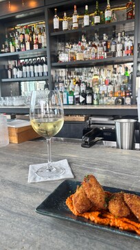 Rooftop bar wine and croquettes