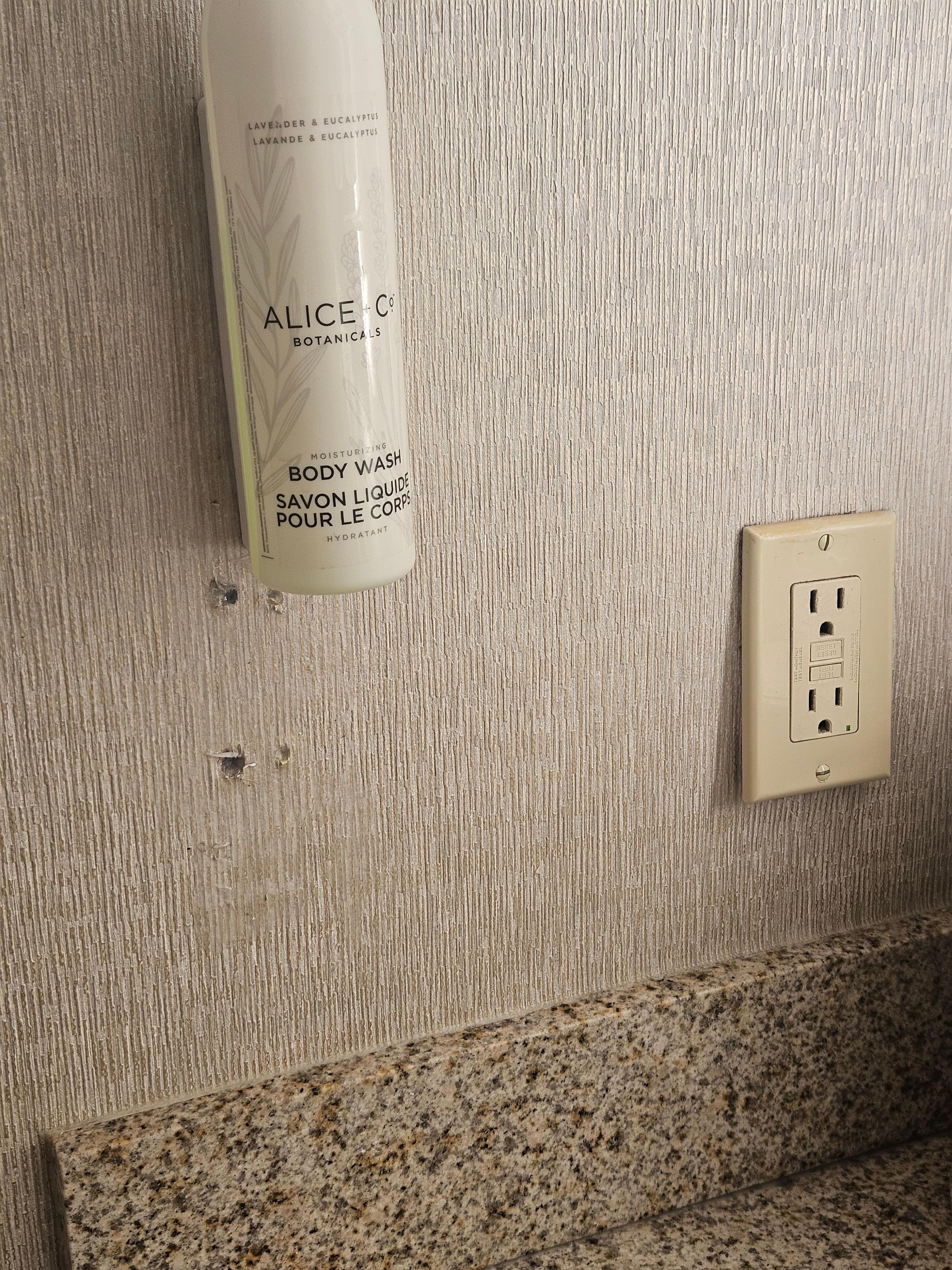 Outlet and holes in wall