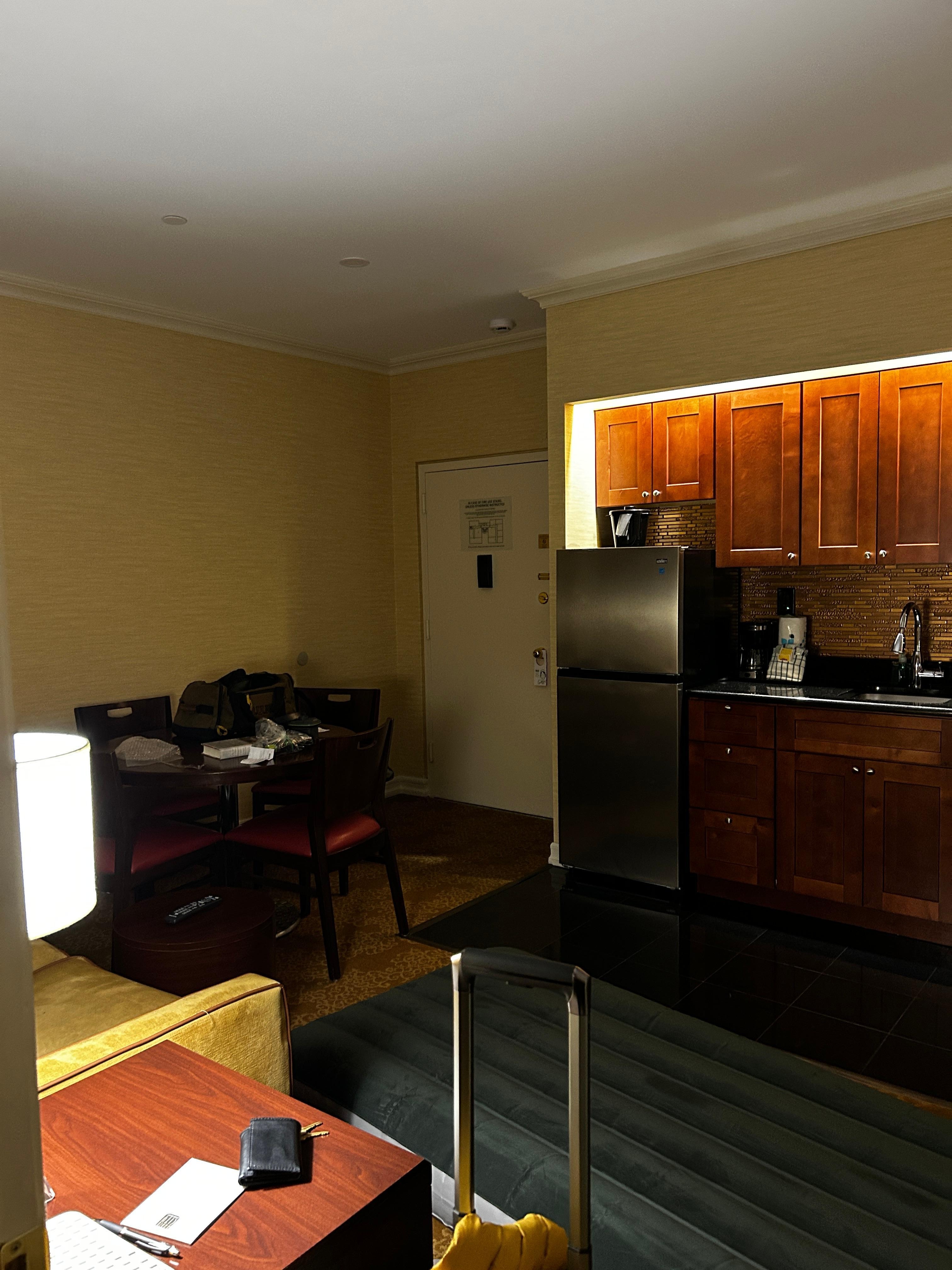 Suite showing kitchenette and sitting area.