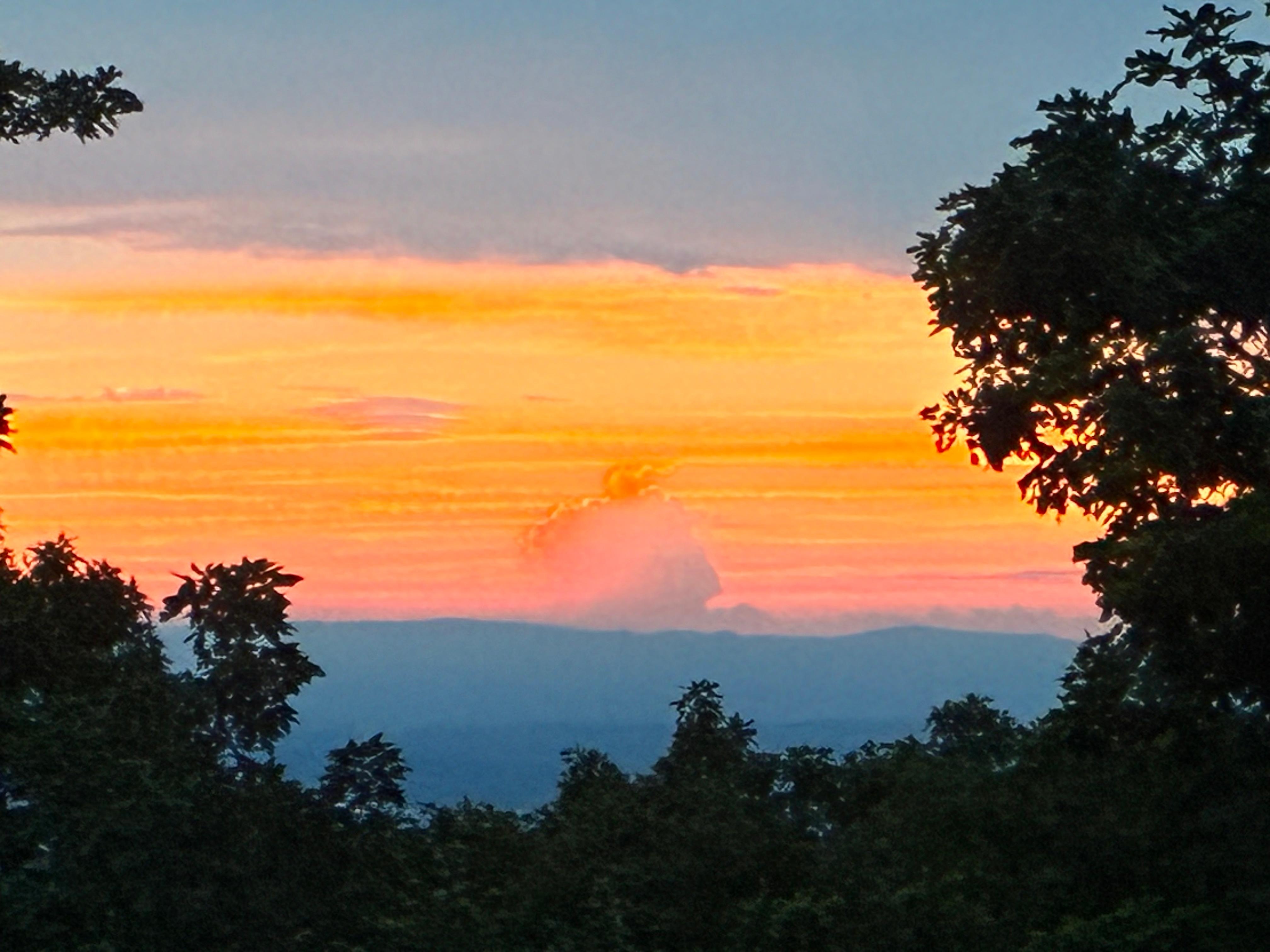 Sunset from balcony at property.